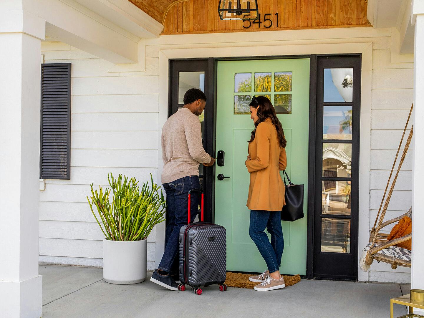 Photo of Airbnb guests entering a property